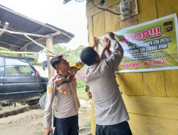 Polsek Rarowatu Ajak Warga Desa Tahi ite Jaga Lingkungan Lewat Baliho “Stop PETI”